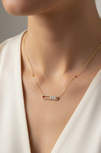 Collier à pierres mobiles
